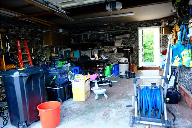a bathroom with a toilet and a washing machine