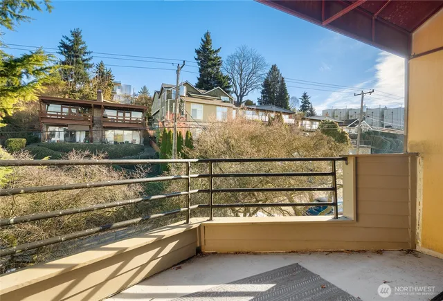 a view of a balcony with a ocean view