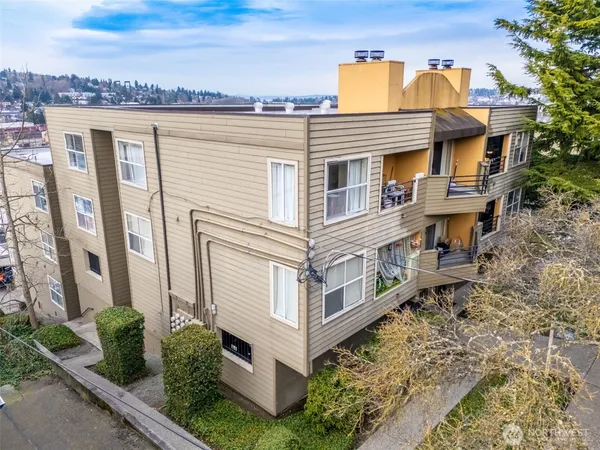 a view of a building with a garden