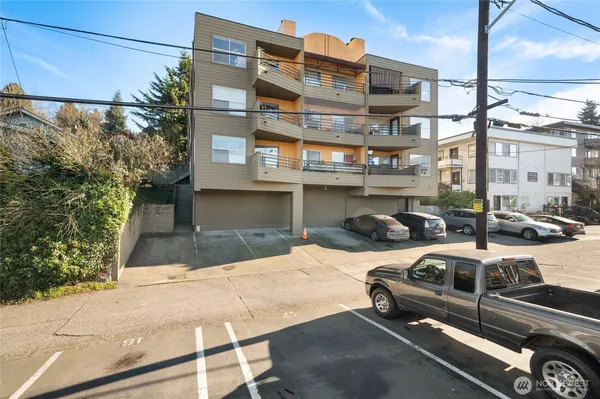a view of a street with cars
