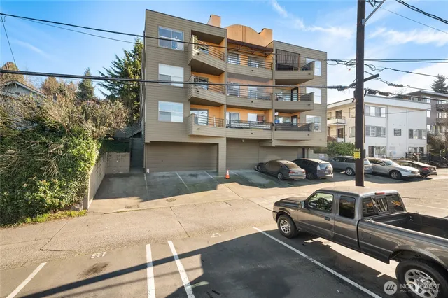 a view of a street with cars