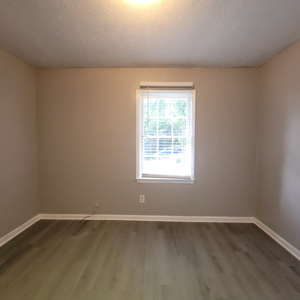 508 23rd Street, Unit A Phenix City, AL 36867 - Photo 9 of 14 an empty room with a window