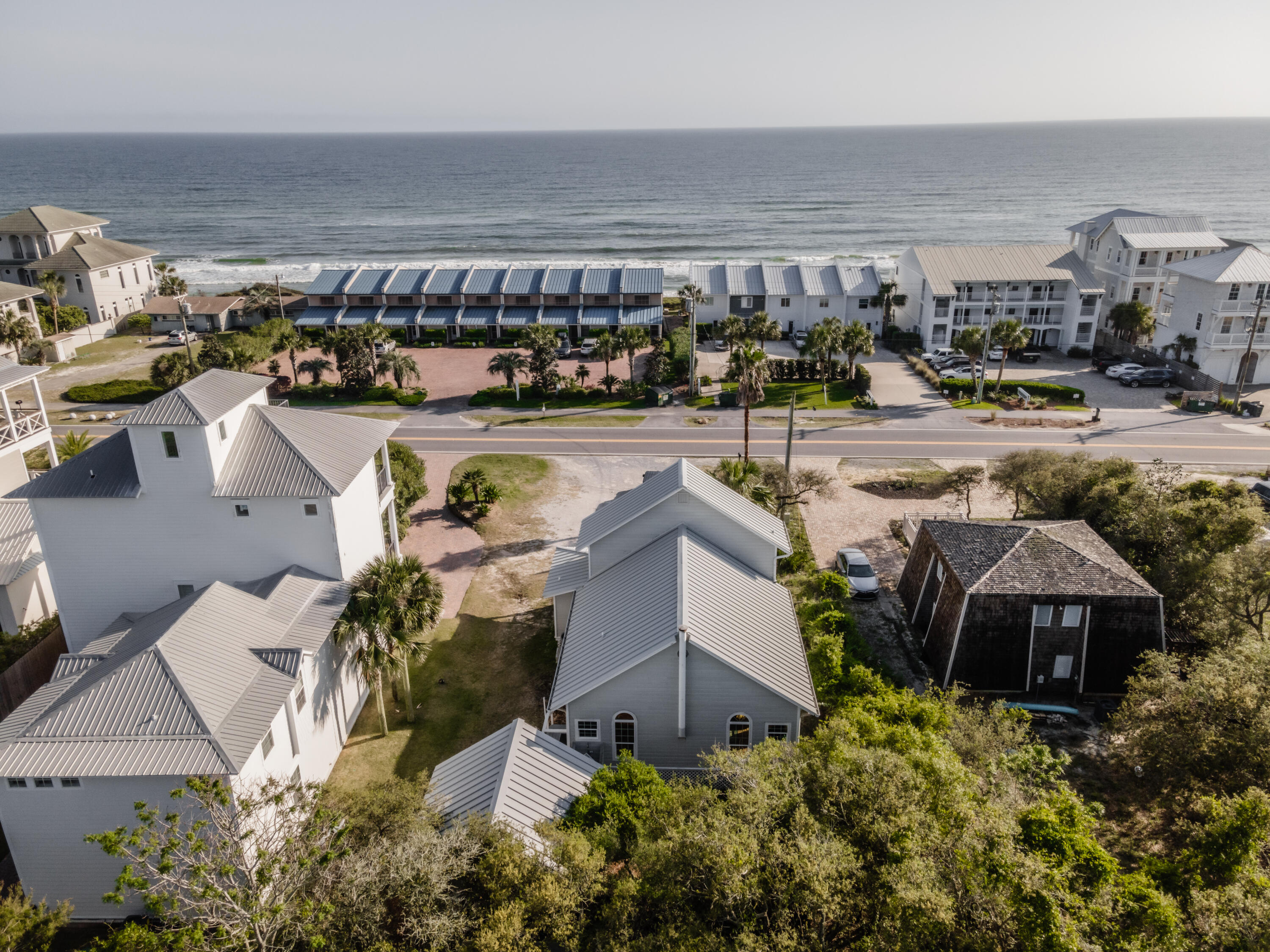 a view of a swimming pool and outdoor seating