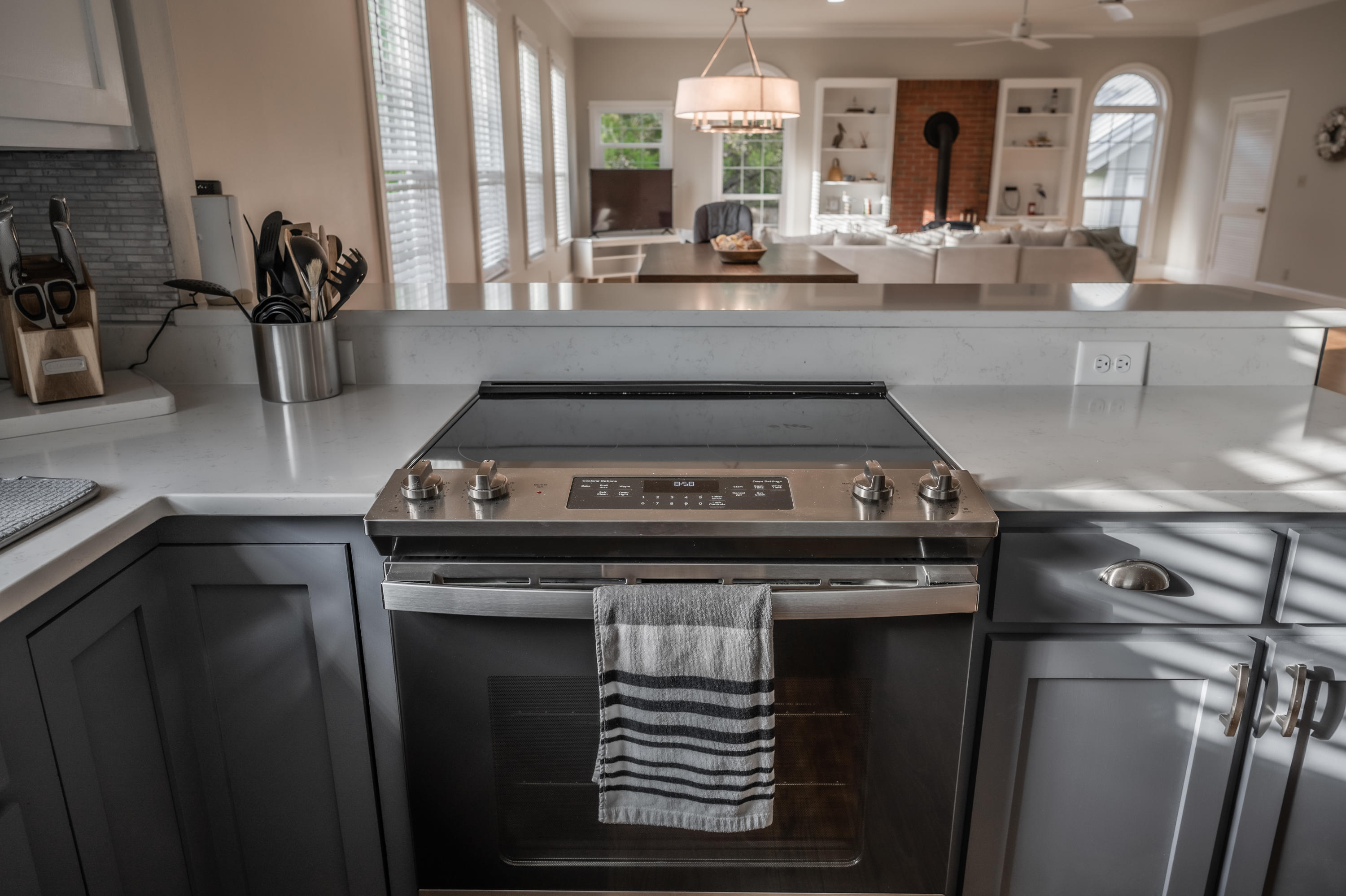 8103 East County Highway 30A Inlet Beach, FL 32461 - Photo 15 of 46 a kitchen with a stove and a sink