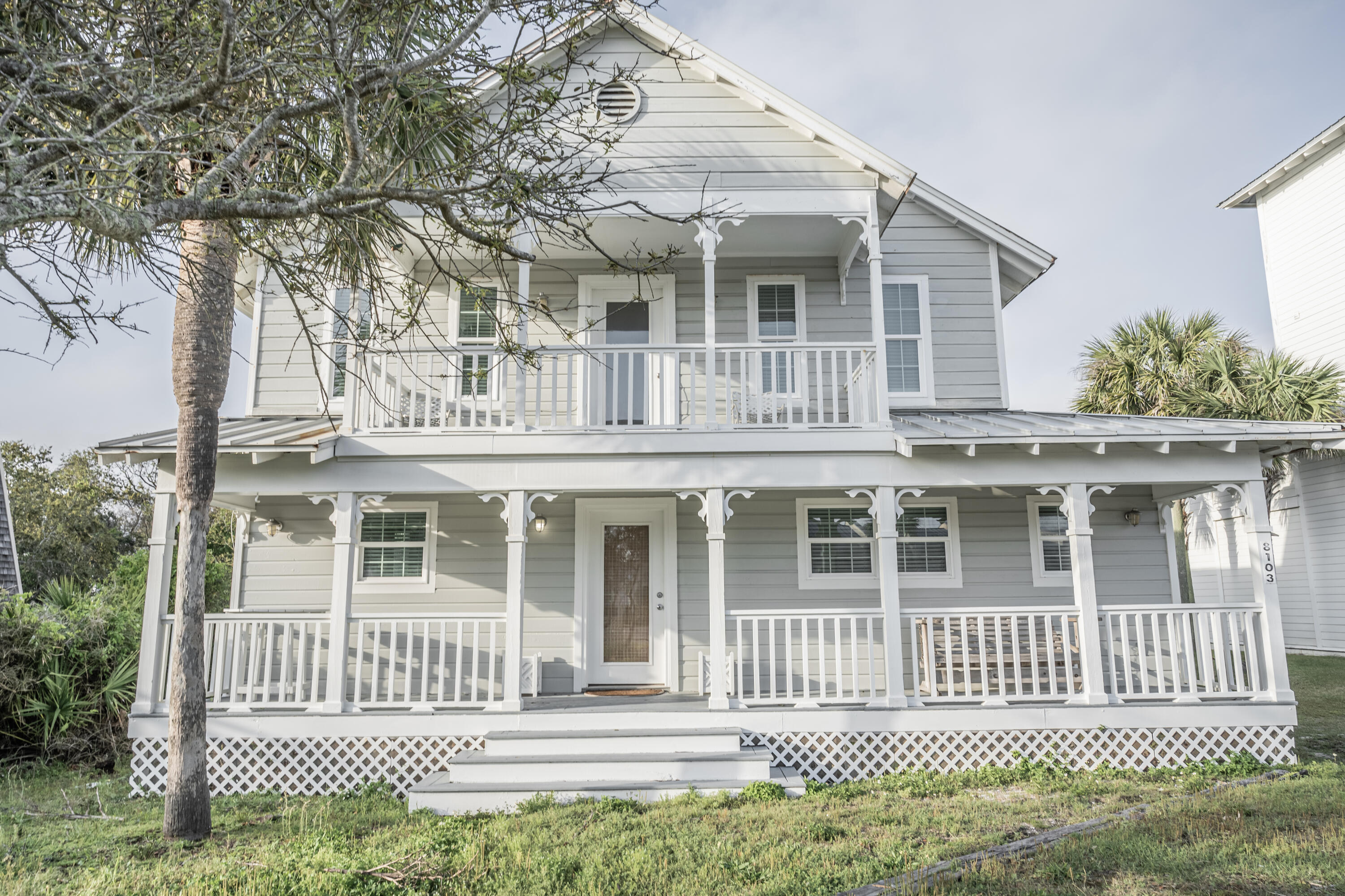 8103 East County Highway 30A Inlet Beach, FL 32461 - Photo 3 of 46 a front view of a house with a garden