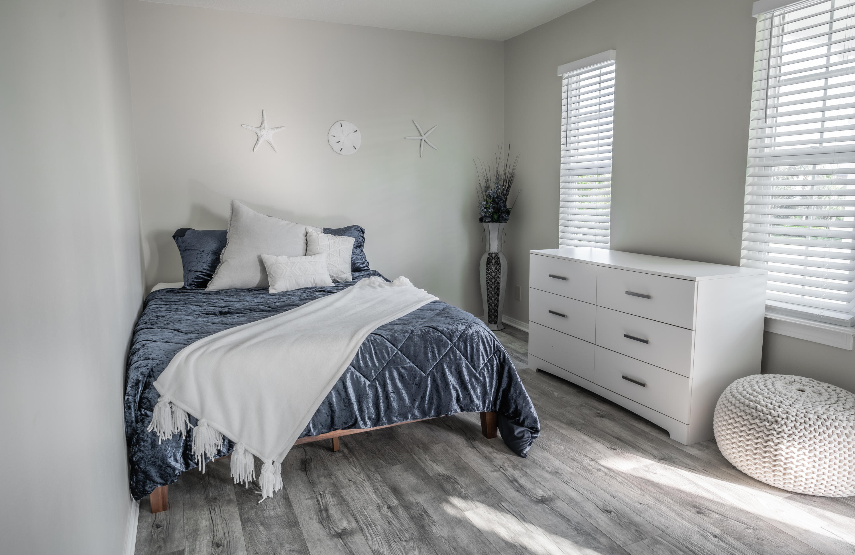 8103 East County Highway 30A Inlet Beach, FL 32461 - Photo 22 of 46 a bedroom with a bed and a window