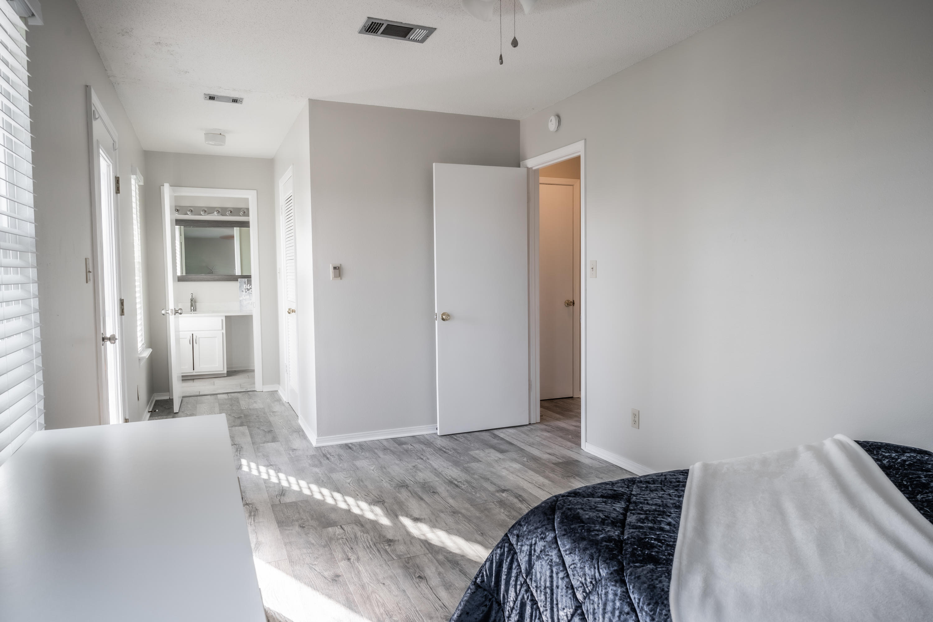 8103 East County Highway 30A Inlet Beach, FL 32461 - Photo 23 of 46 a bedroom with a bed and closet