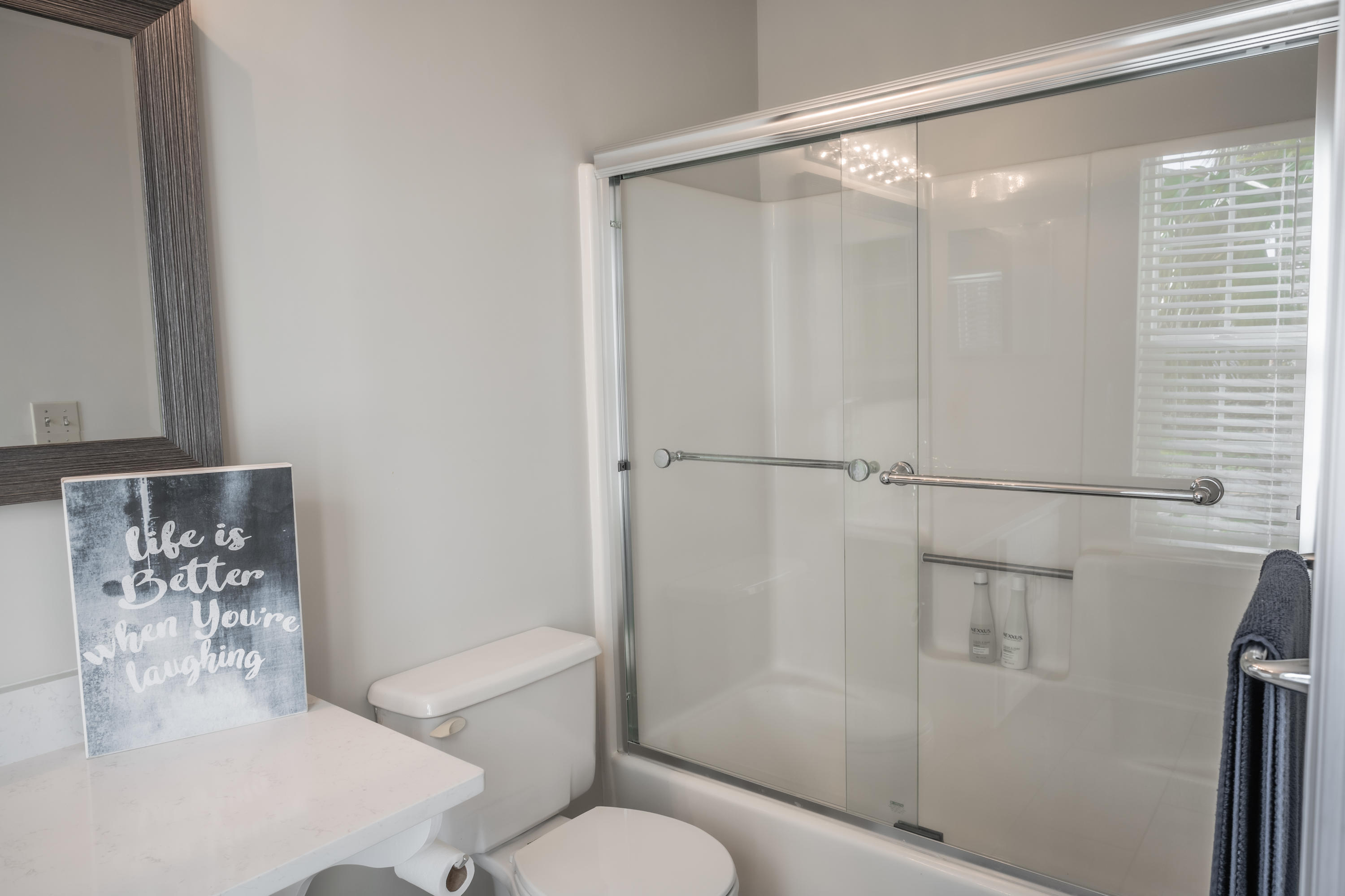 8103 East County Highway 30A Inlet Beach, FL 32461 - Photo 33 of 46 a bathroom with a shower and toilet