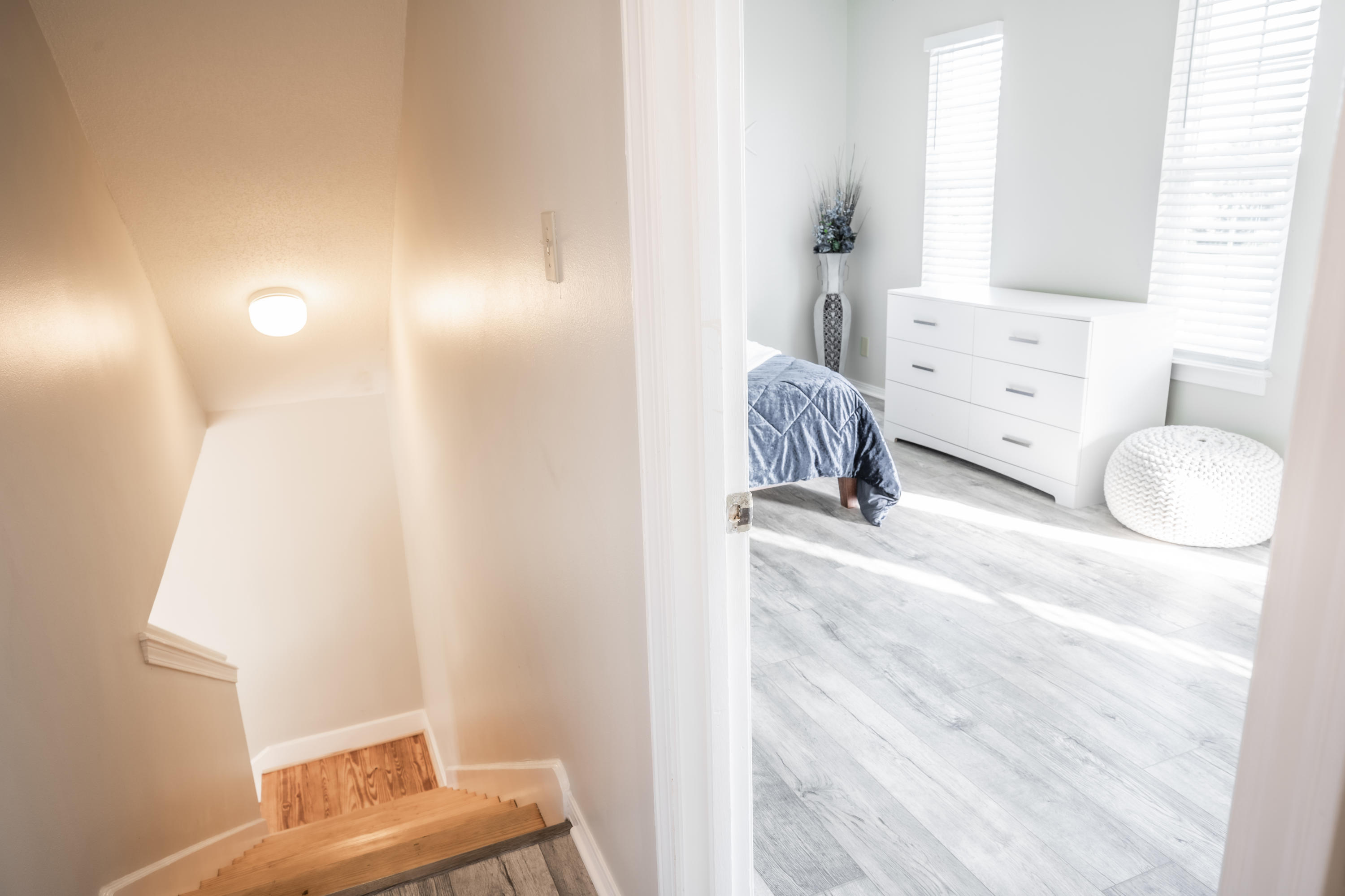 8103 East County Highway 30A Inlet Beach, FL 32461 - Photo 34 of 46 a bedroom with a bed and a window