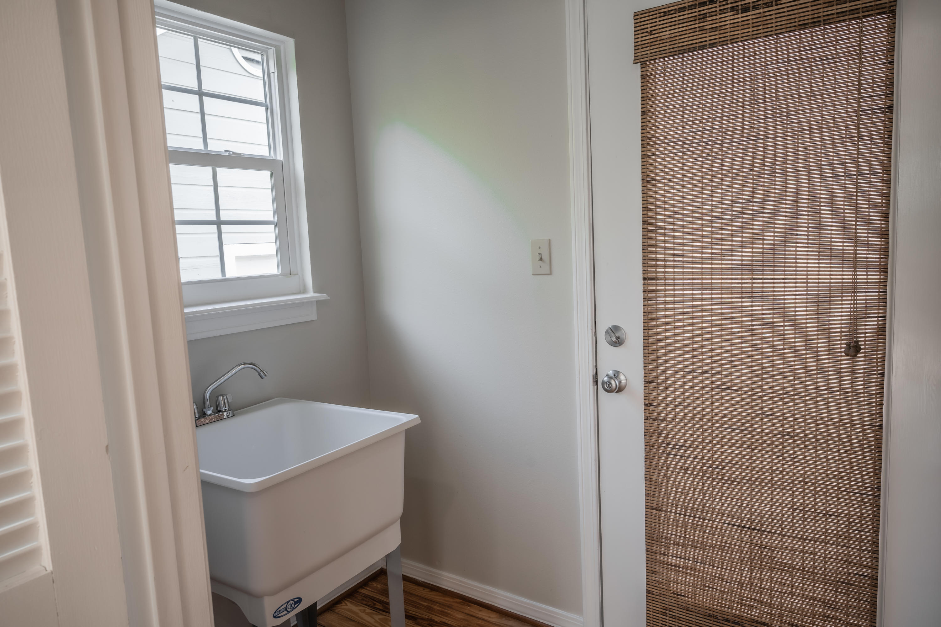 8103 East County Highway 30A Inlet Beach, FL 32461 - Photo 37 of 46 a bathroom with a tub and a window