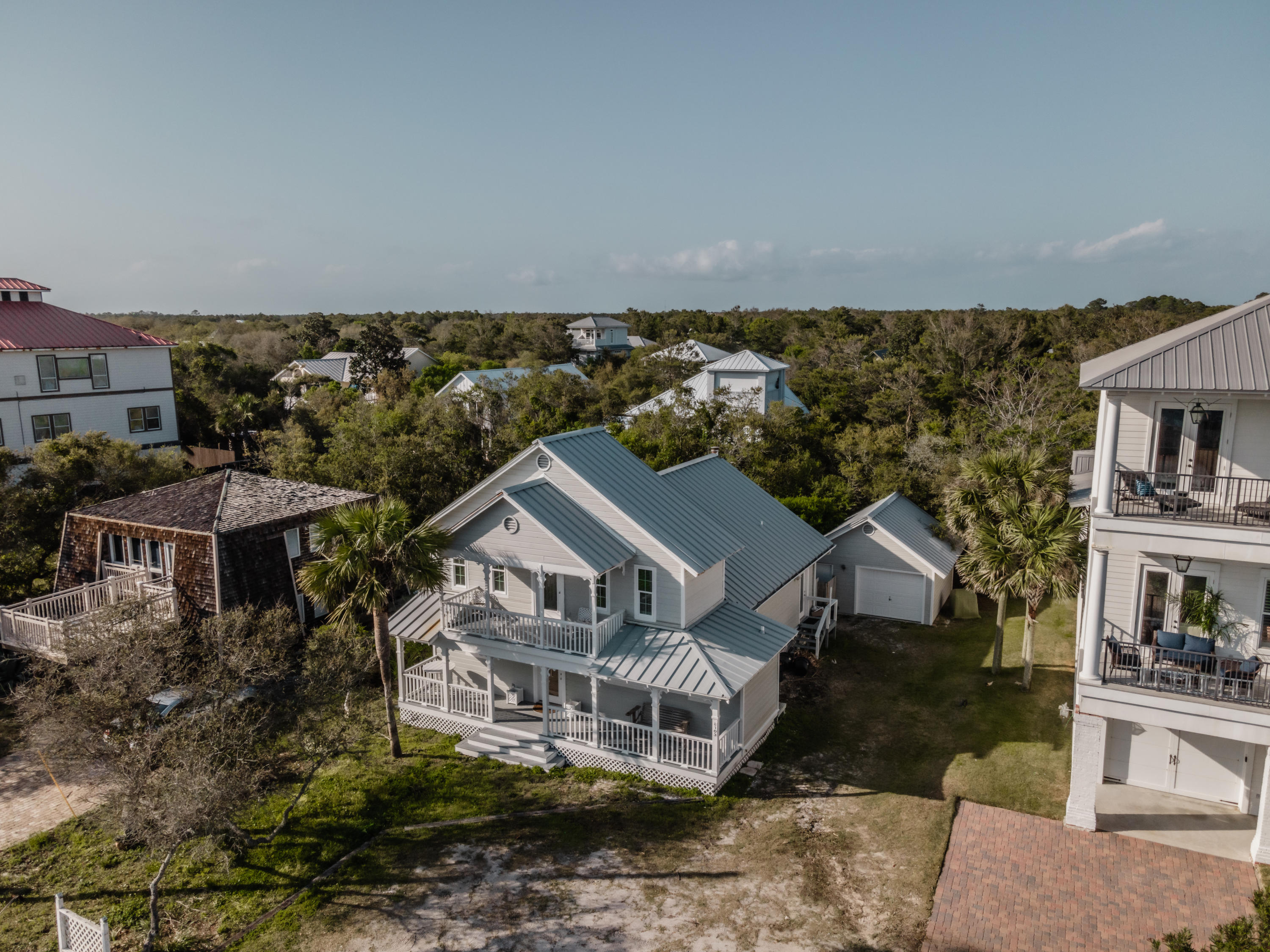 8103 East County Highway 30A Inlet Beach, FL 32461 - Photo 6 of 46 an aerial view of a house with a yard
