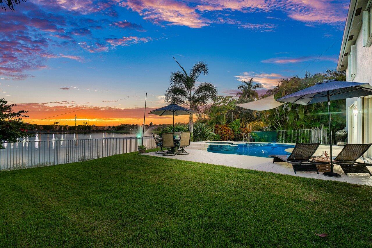 10290 Northwest 60th Place Parkland, FL 33076 - Photo 11 of 36 a view of a backyard with sitting area