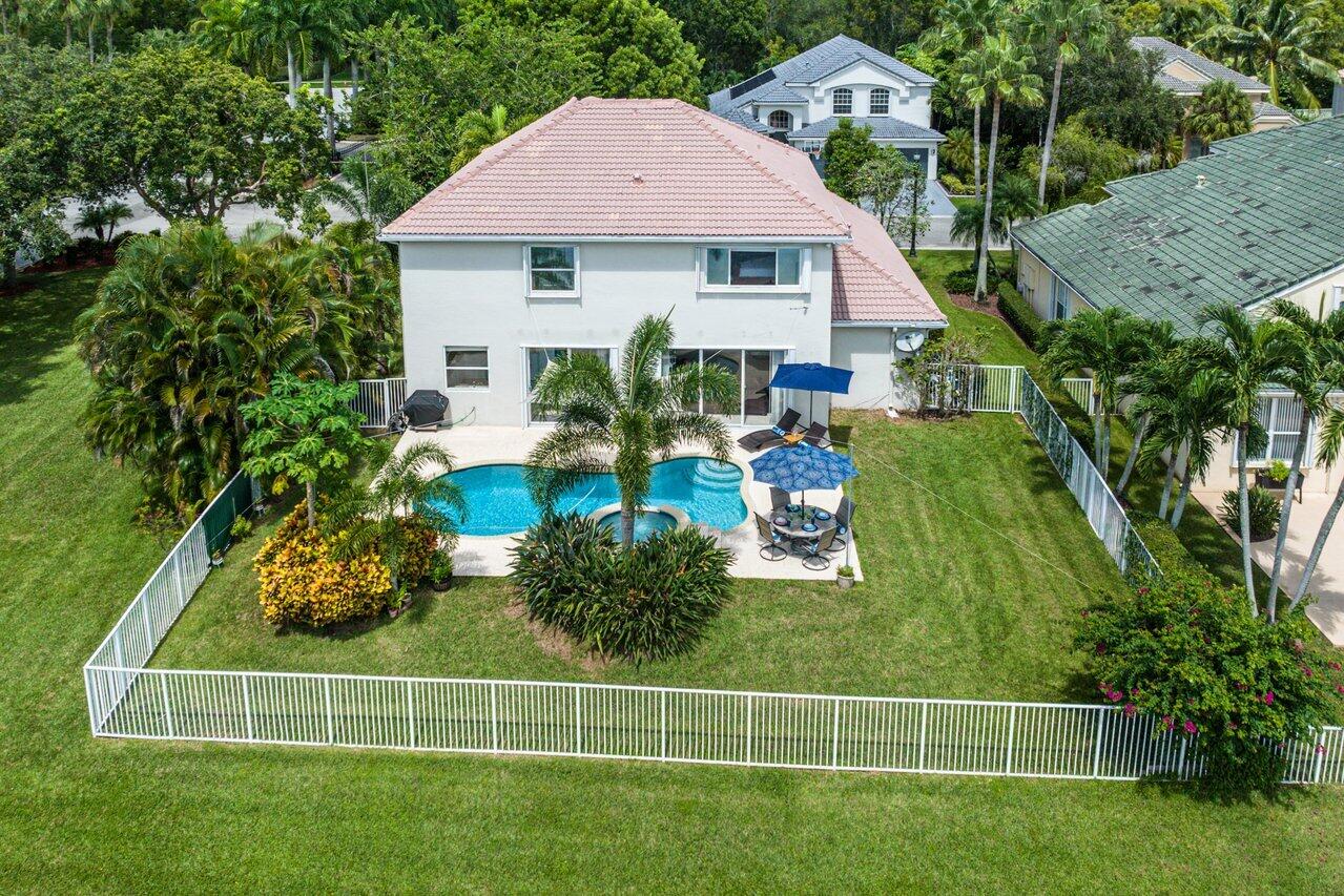 10290 Northwest 60th Place Parkland, FL 33076 - Photo 22 of 36 a house view with a garden space
