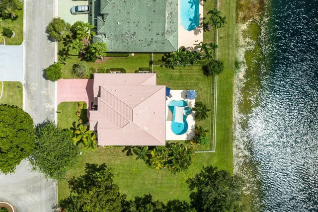 an aerial view of a house with a garden
