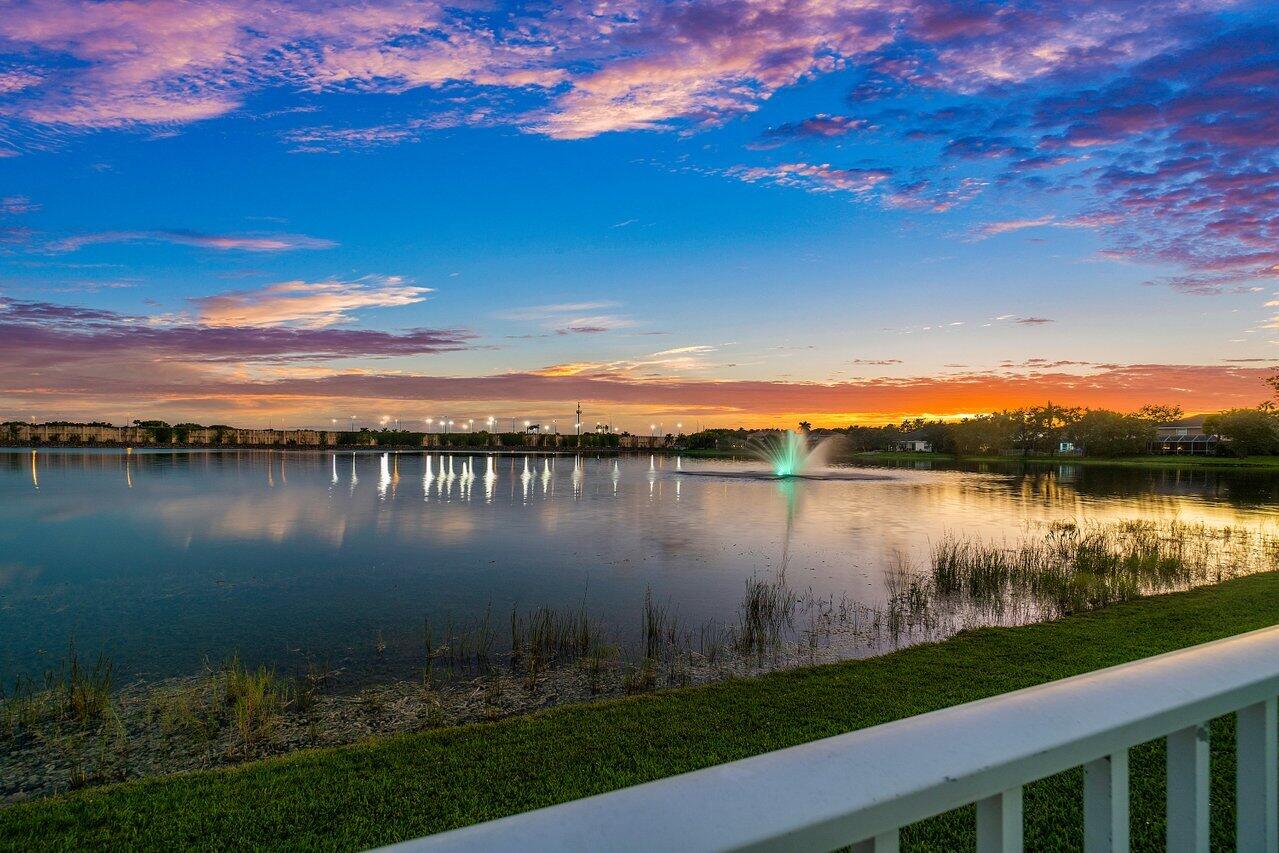 10290 Northwest 60th Place Parkland, FL 33076 - Photo 9 of 36 a view of a lake from a yard