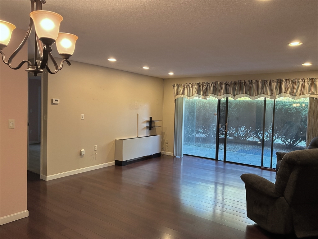 2 Summit Drive, Unit 18 Wakefield, MA 01880 - Photo 8 of 11 a view of a livingroom with furniture