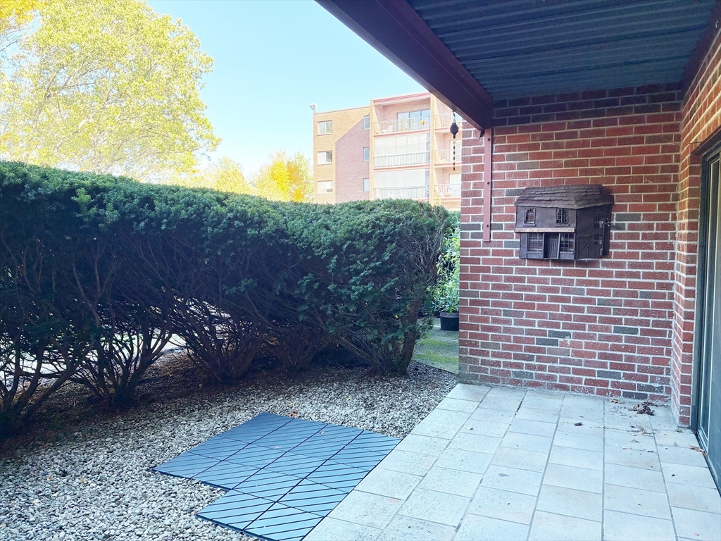 2 Summit Drive, Unit 18 Wakefield, MA 01880 - Photo 9 of 11 a view of a pathway both side of building