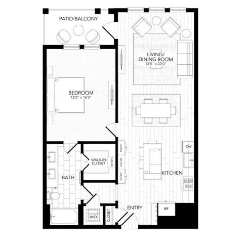 a bedroom with a bed and a potted plant