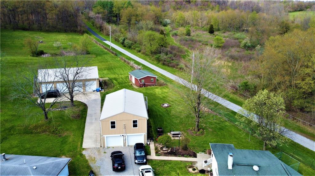 215 Glen Eden Road Rochester, PA 15074 - Photo 2 of 25 an aerial view of a house with a yard and lake view