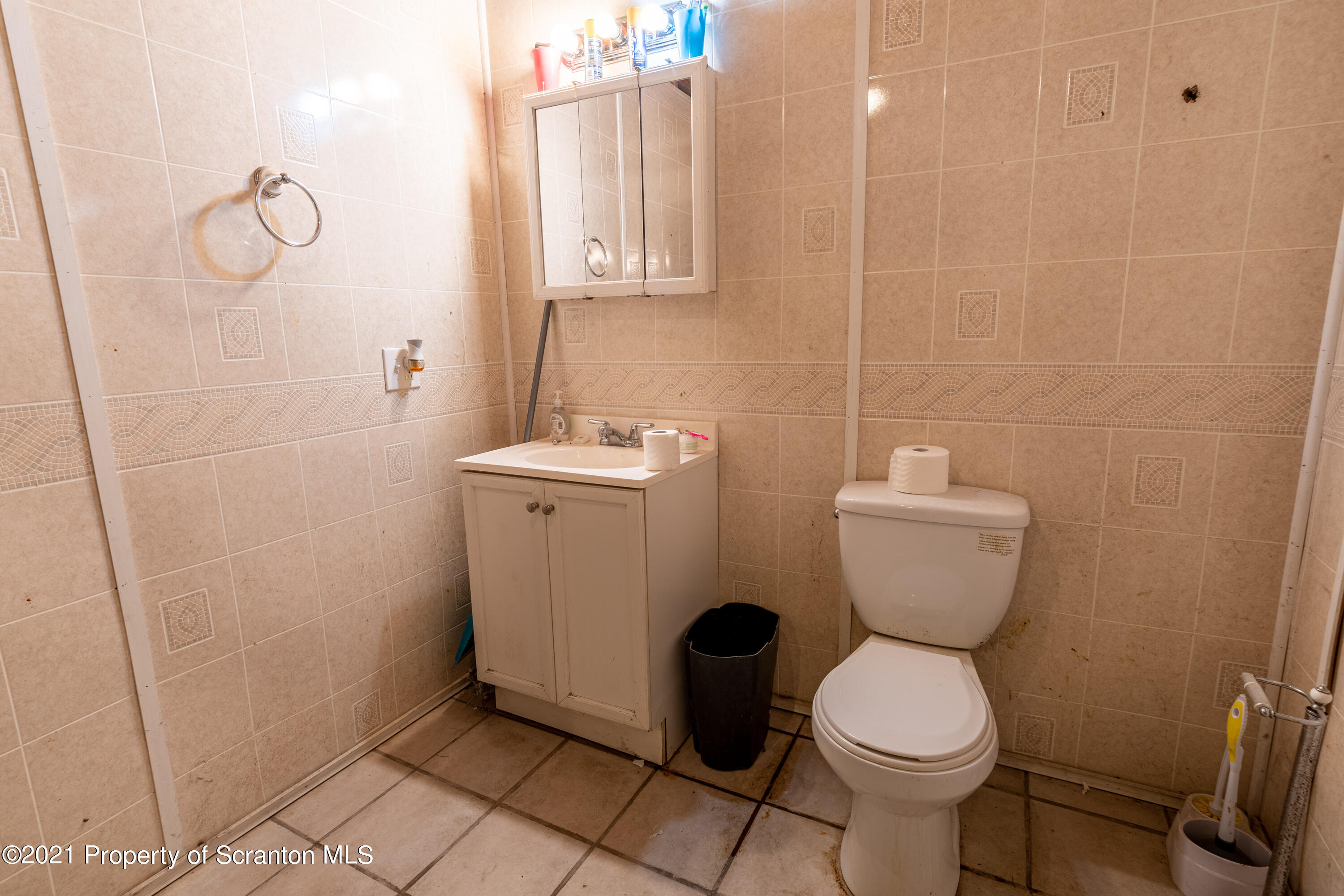 172 Potter Road Kingsley, PA 18826 - Photo 28 of 56 a bathroom with a toilet and a sink