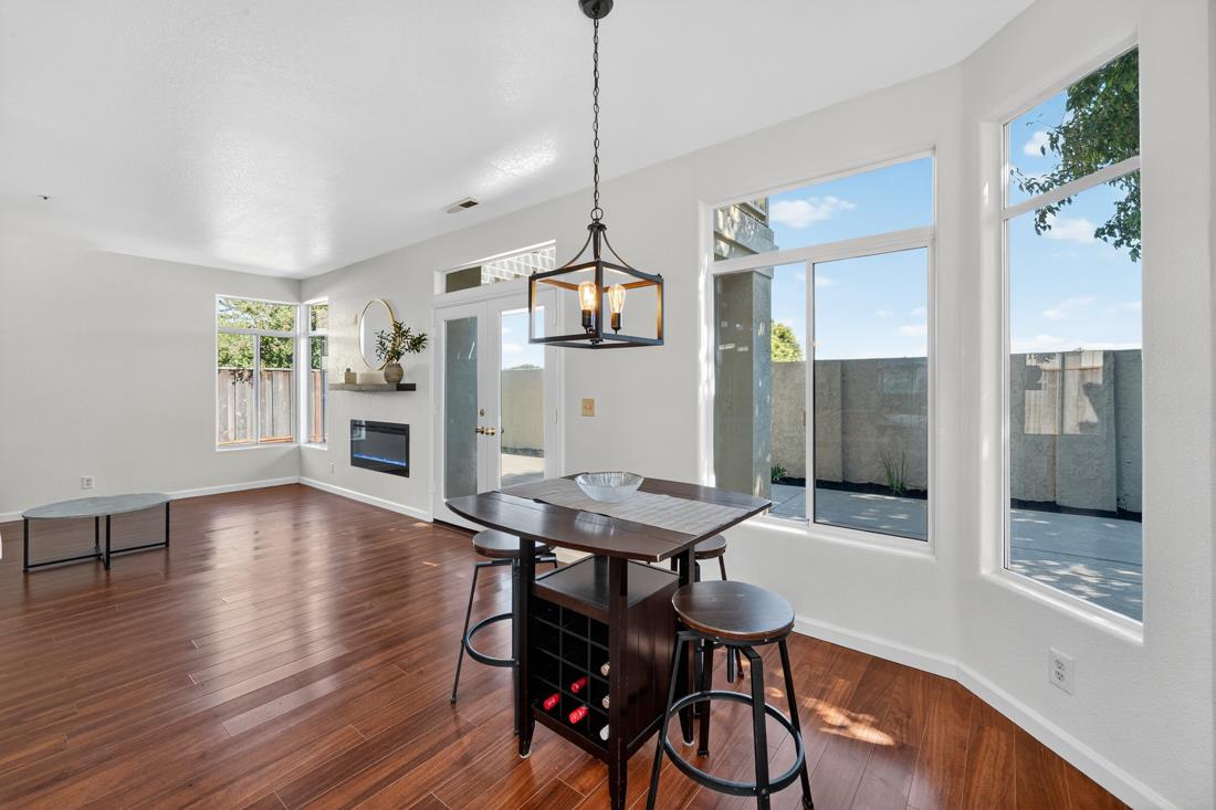 17671 Riverbend Road Salinas, CA 93908 - Photo 16 of 48 a view of a dining room with furniture and wooden floor