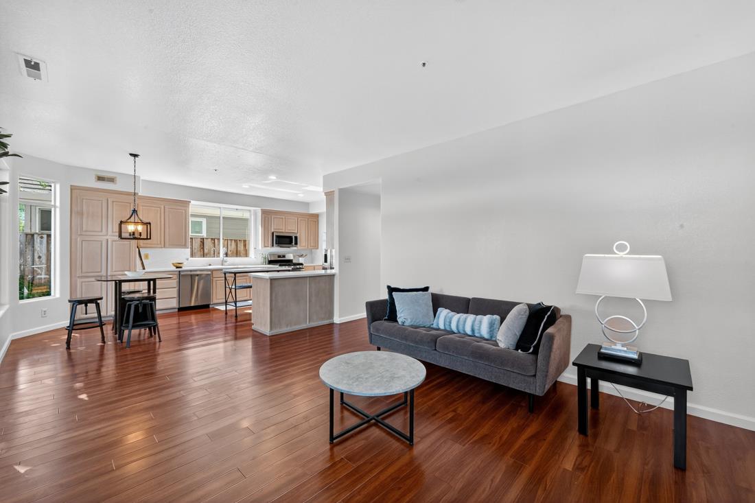 17671 Riverbend Road Salinas, CA 93908 - Photo 19 of 48 a living room with furniture and a wooden floor