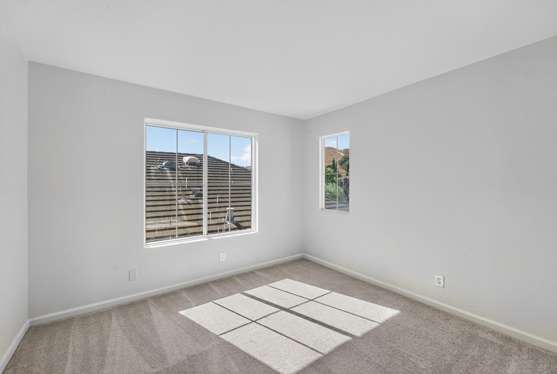 17671 Riverbend Road Salinas, CA 93908 - Photo 25 of 48 a view of an empty room with a window