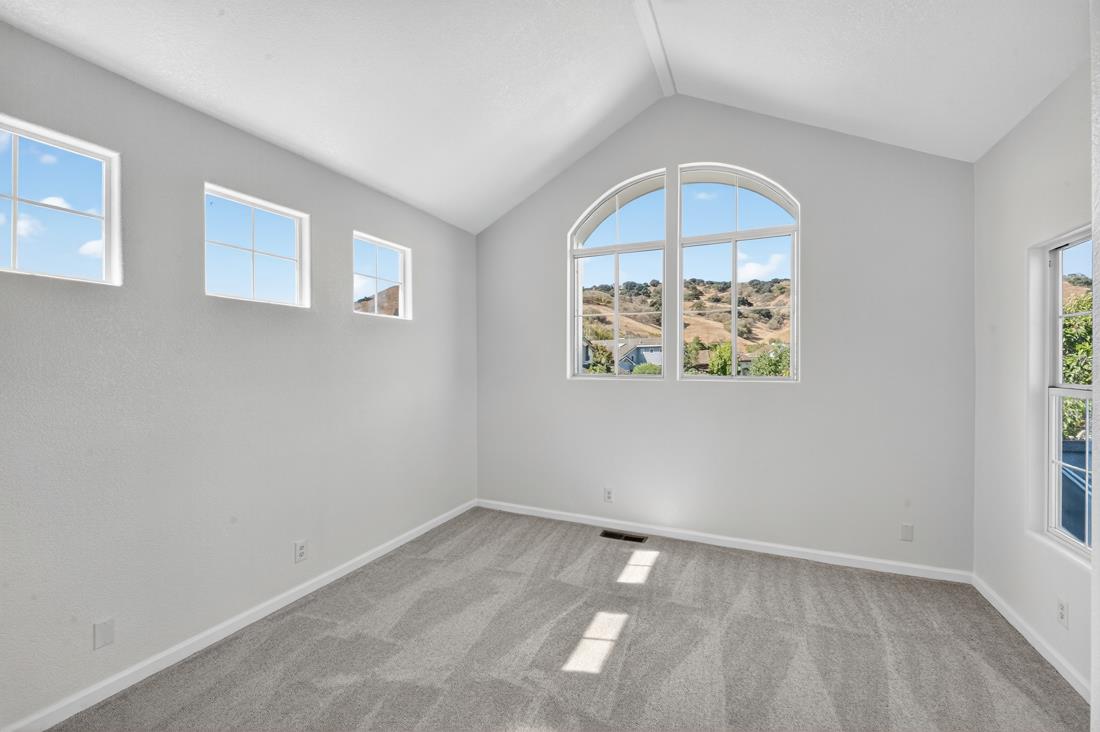 17671 Riverbend Road Salinas, CA 93908 - Photo 27 of 48 an empty room with a window