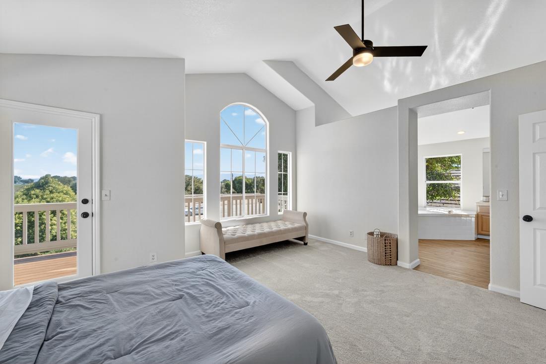 17671 Riverbend Road Salinas, CA 93908 - Photo 34 of 48 a bedroom with a bed and a large window