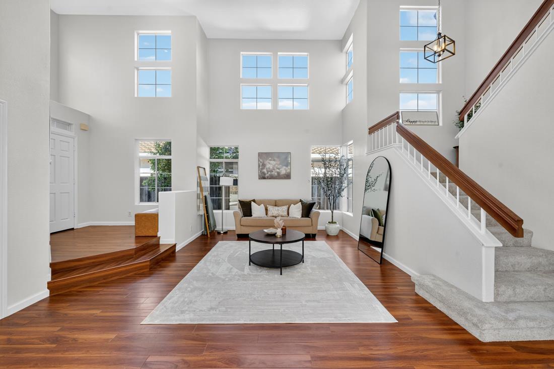 17671 Riverbend Road Salinas, CA 93908 - Photo 6 of 48 a living room with furniture and a wooden floor