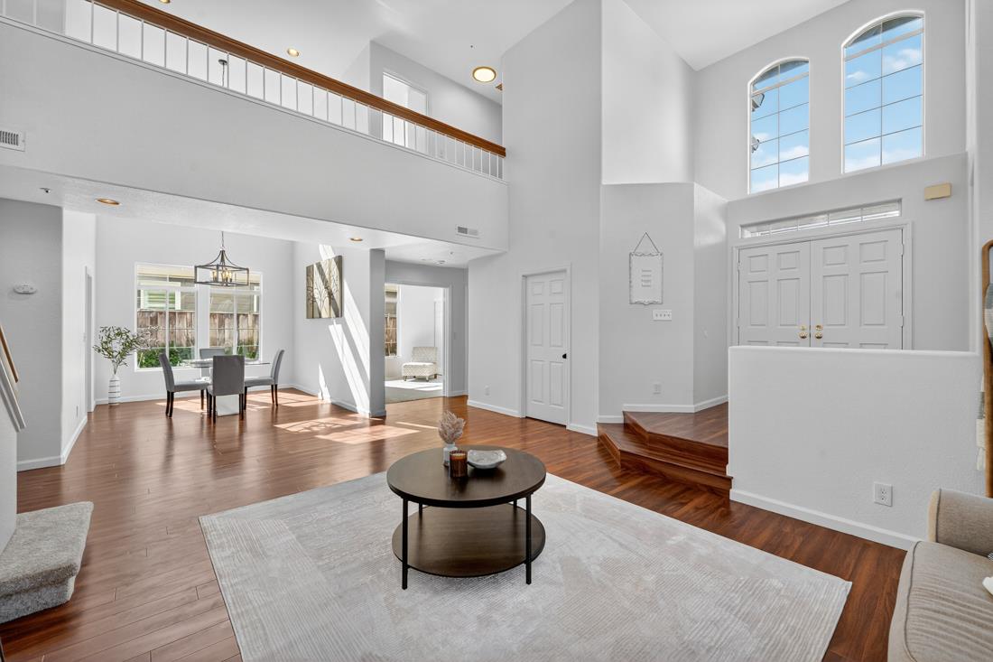 17671 Riverbend Road Salinas, CA 93908 - Photo 8 of 48 a living room with furniture and a wooden floor