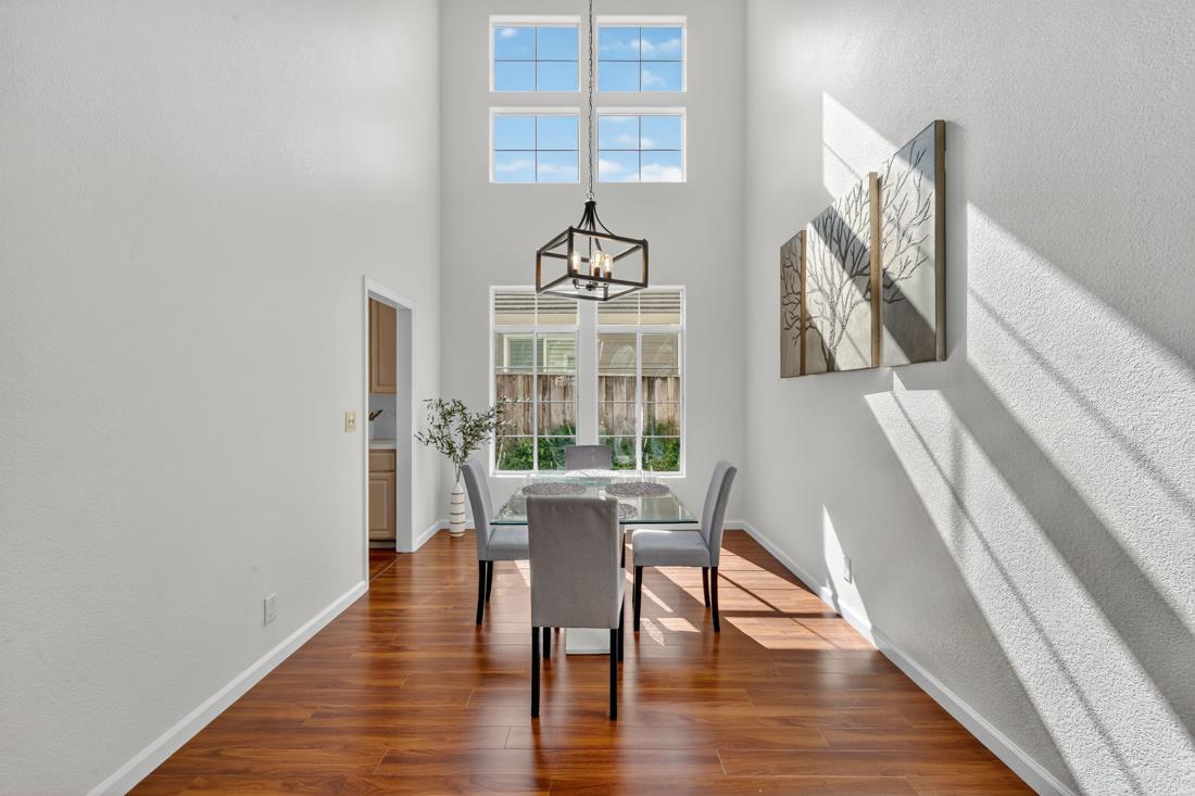 17671 Riverbend Road Salinas, CA 93908 - Photo 9 of 48 a view of a dining room with furniture window and wooden floor