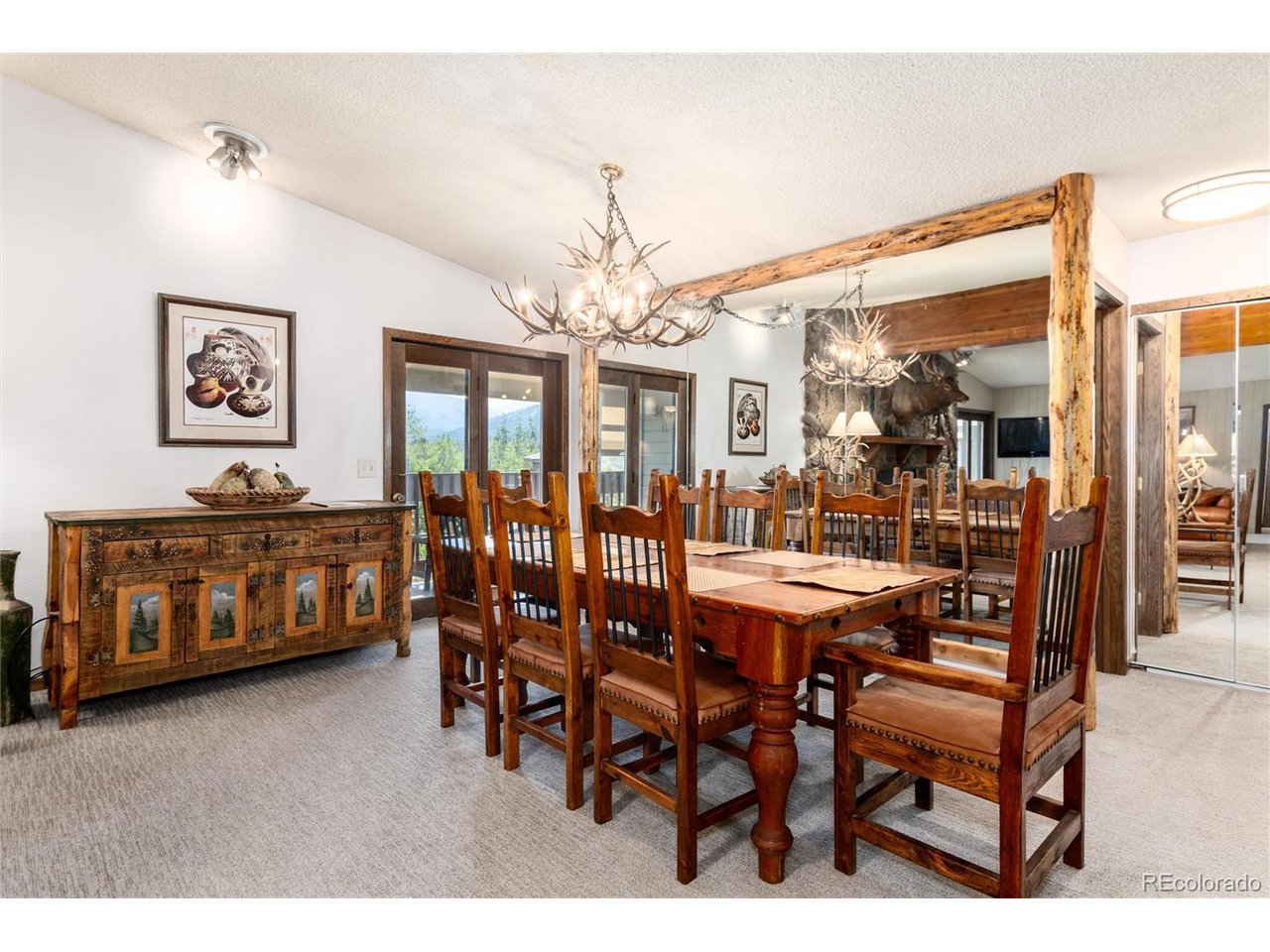 490 Kings Crossing Road, Unit 631 Winter Park, CO 80482 - Photo 9 of 43 a dining room with furniture and window
