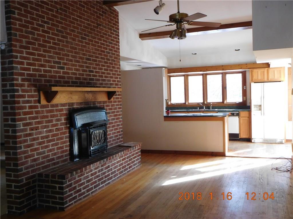 38 Middle Road Cumberland Center, ME 04021 - Photo 4 of 17 Dining area with fireplace