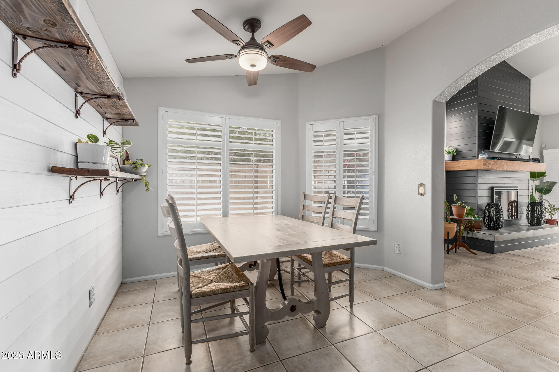 15587 West Rio Vista Lane Goodyear, AZ 85338 - Photo 18 of 36 a dining room with furniture and window