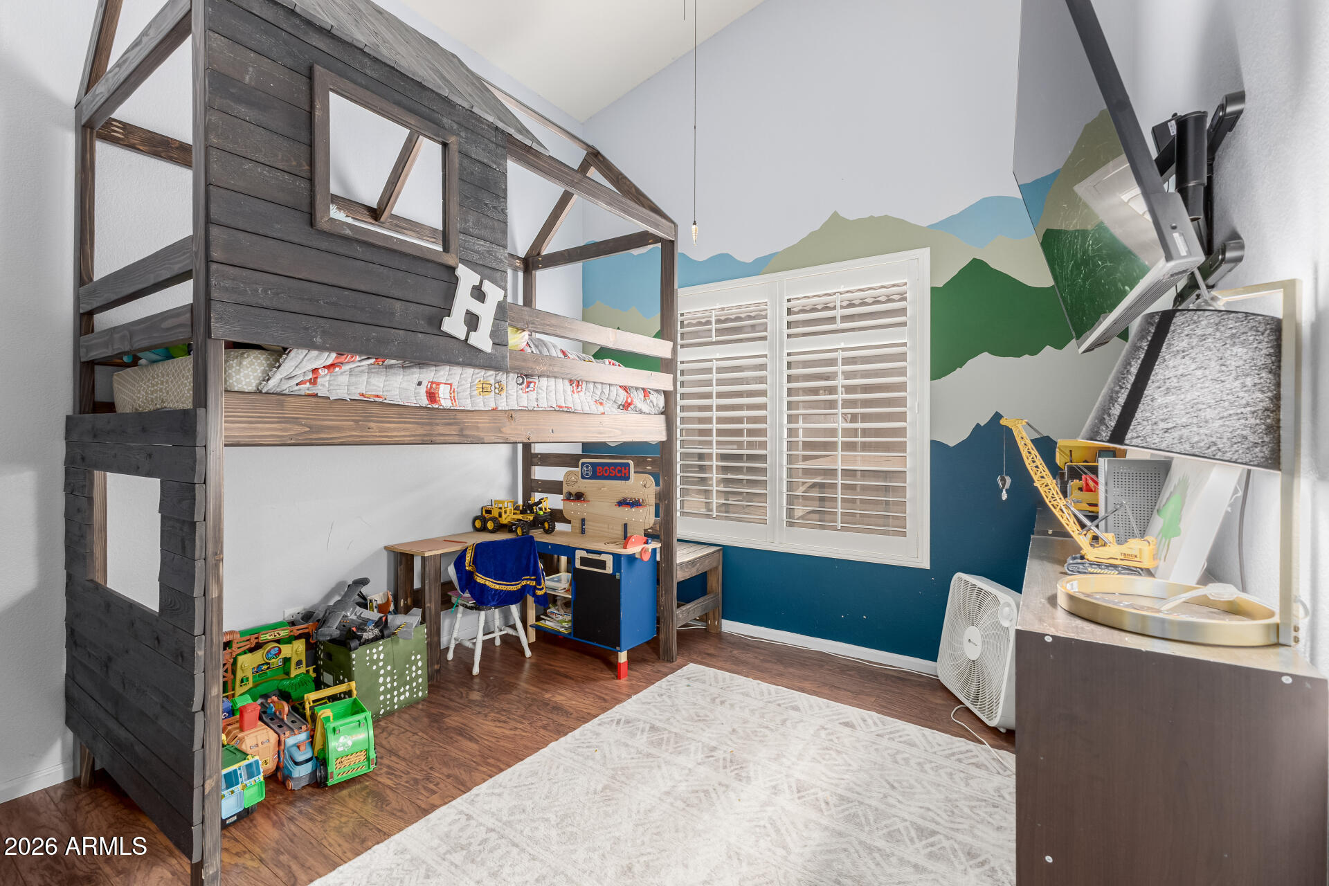 15587 West Rio Vista Lane Goodyear, AZ 85338 - Photo 24 of 36 a view of a livingroom with furniture and a window
