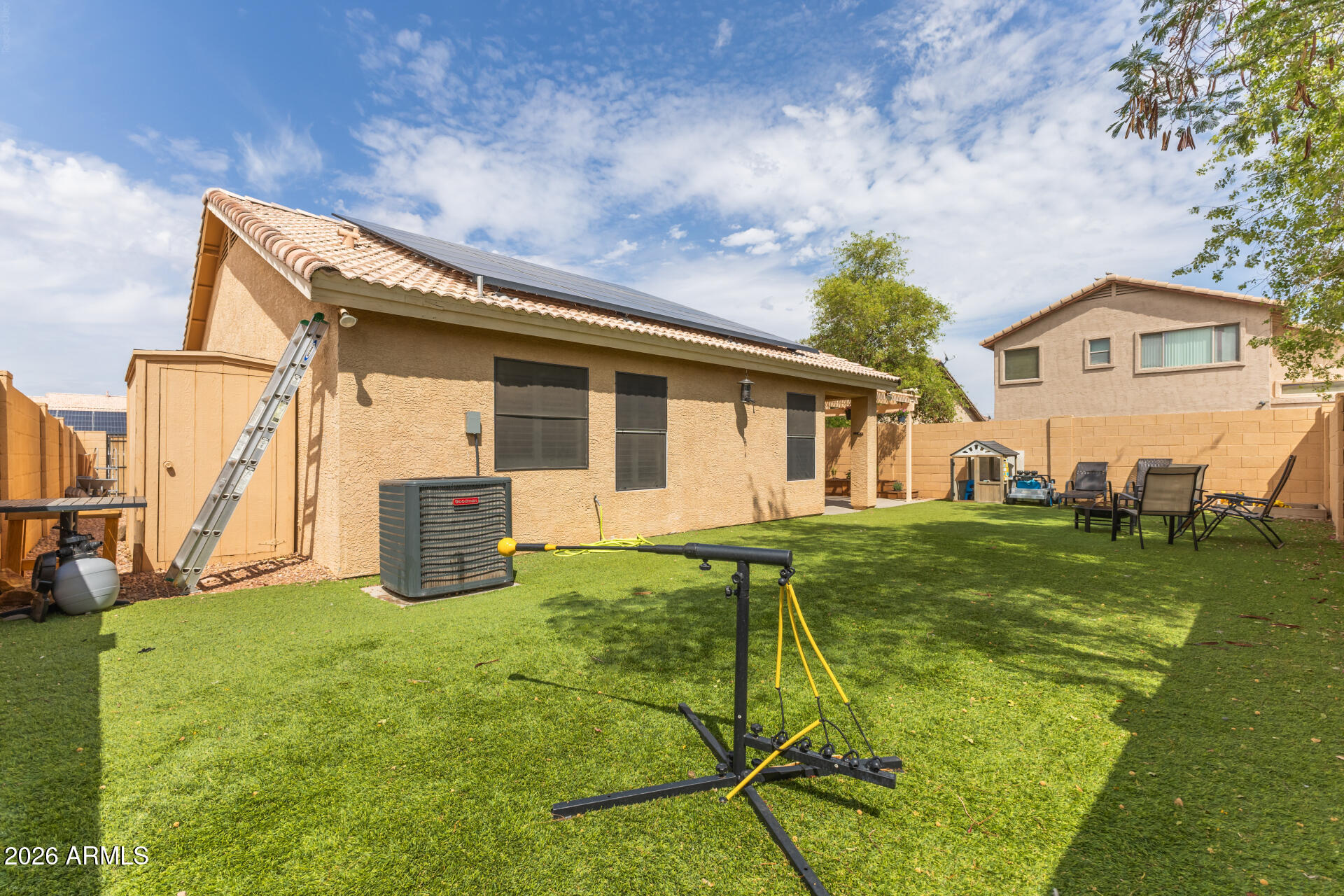 15587 West Rio Vista Lane Goodyear, AZ 85338 - Photo 33 of 36 a house view with a backyard space