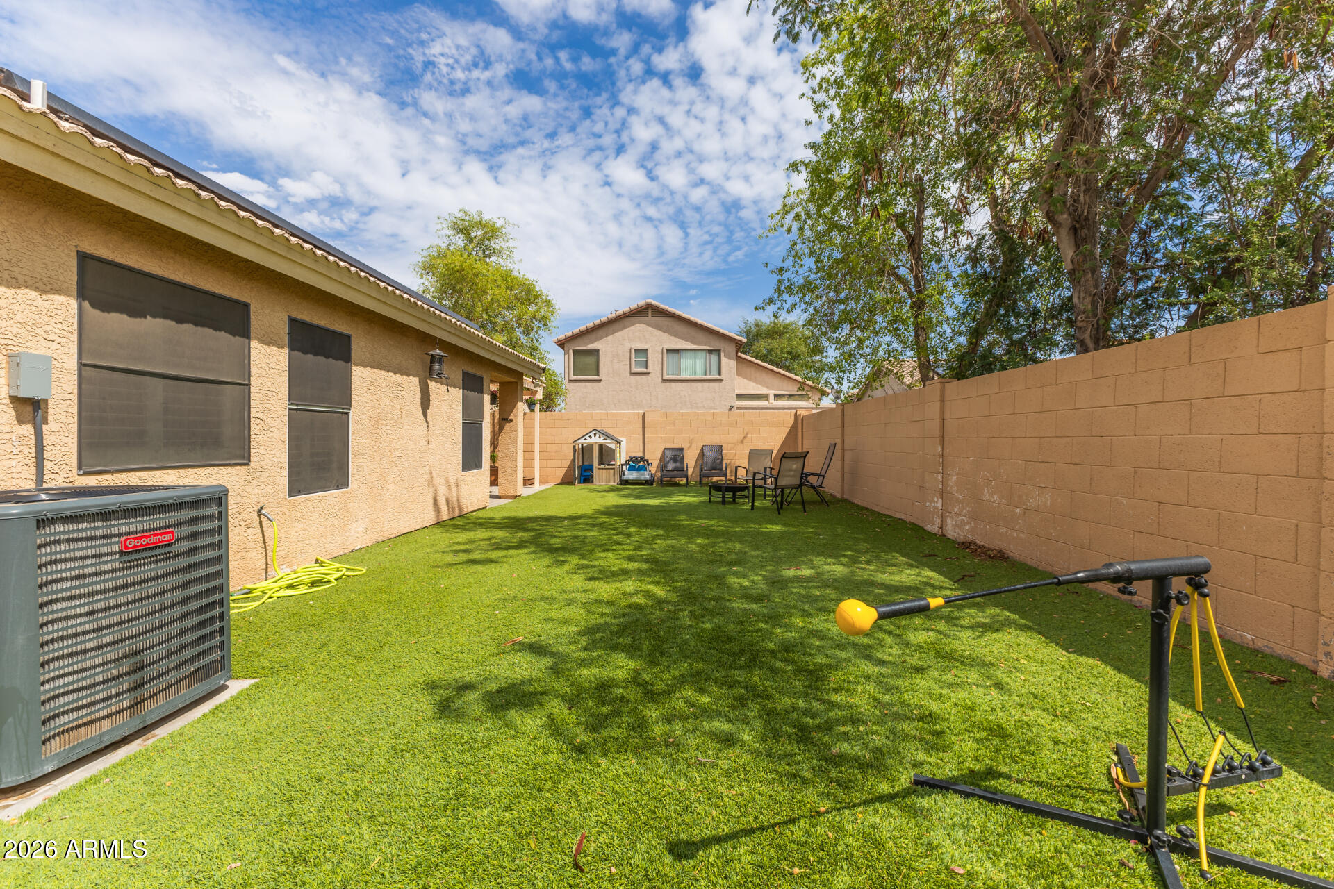 15587 West Rio Vista Lane Goodyear, AZ 85338 - Photo 34 of 36 a backyard of a house with lots of green space