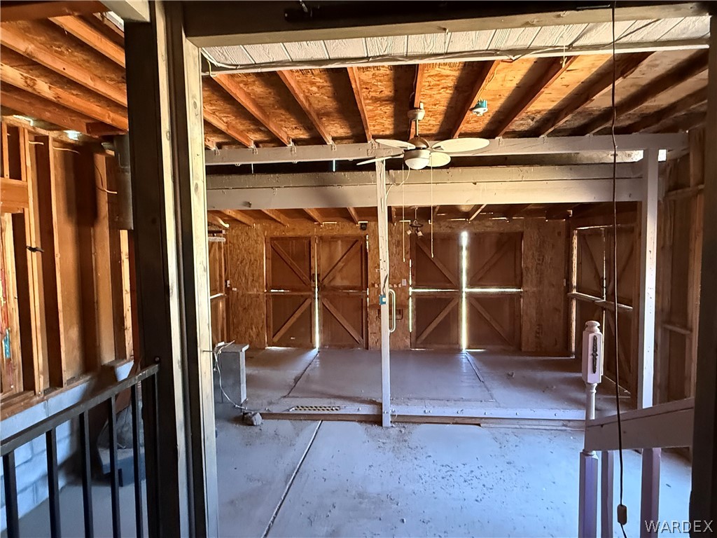 8051 7th Street Dolan Springs, AZ 86441 - Photo 39 of 65 a view of an empty room with wooden floor