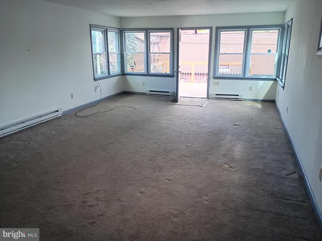 a kitchen with a stove and a microwave
