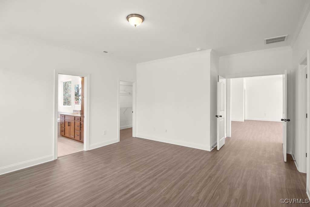 9254 Moldova Road Chesterfield, VA 23832 - Photo 30 of 49 an empty room with wooden floor & windows