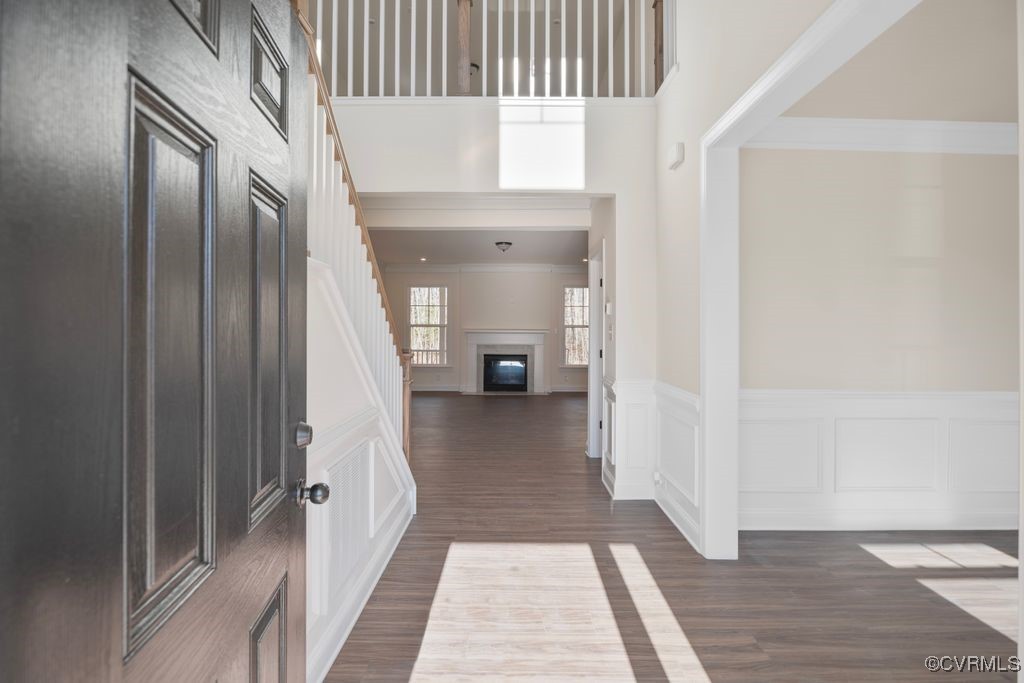 9254 Moldova Road Chesterfield, VA 23832 - Photo 3 of 49 a view of a hallway view with wooden floor and staircase