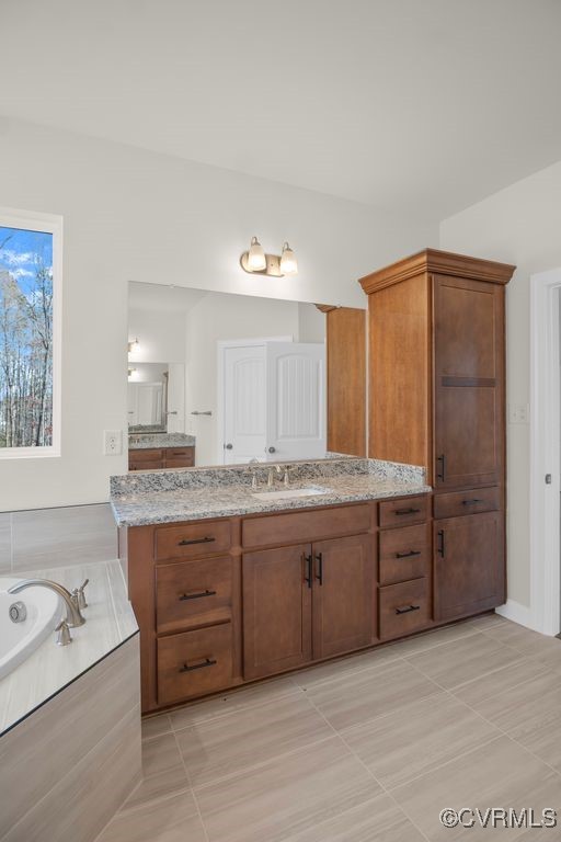 9254 Moldova Road Chesterfield, VA 23832 - Photo 34 of 49 a bathroom with a granite countertop double vanity sink and mirror