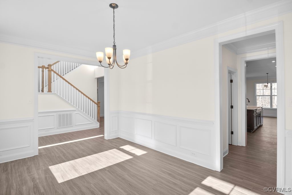 9254 Moldova Road Chesterfield, VA 23832 - Photo 6 of 49 a view of a hallway with wooden floor and staircase