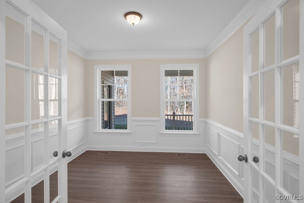 9254 Moldova Road Chesterfield, VA 23832 - Photo 8 of 49 a view of an empty room with wooden floor and a window