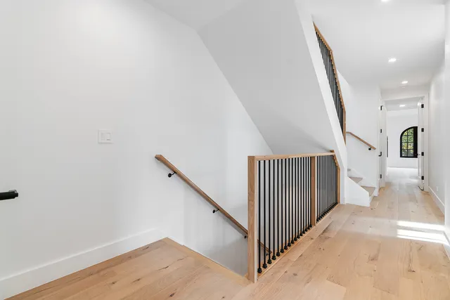 a view of a hallway with staircase