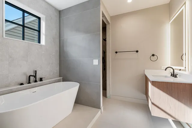 a bathroom with a sink and a bathtub
