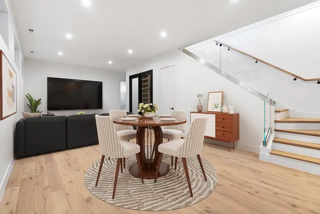 a view of a dining room with furniture