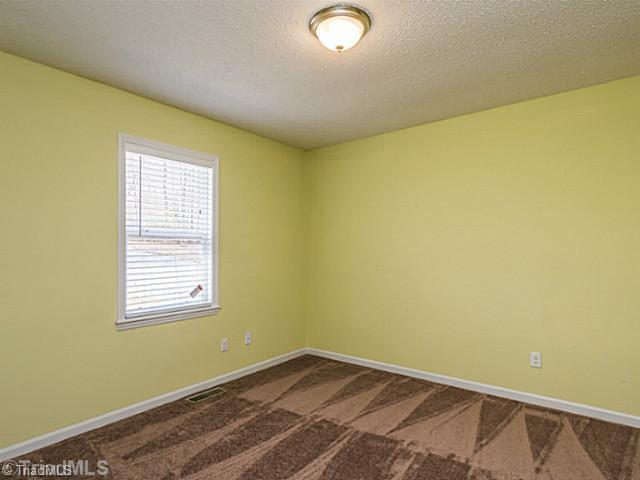 5507 John Washington Road Browns Summit, NC 27214 - Photo 7 of 16 Master Bedroom.