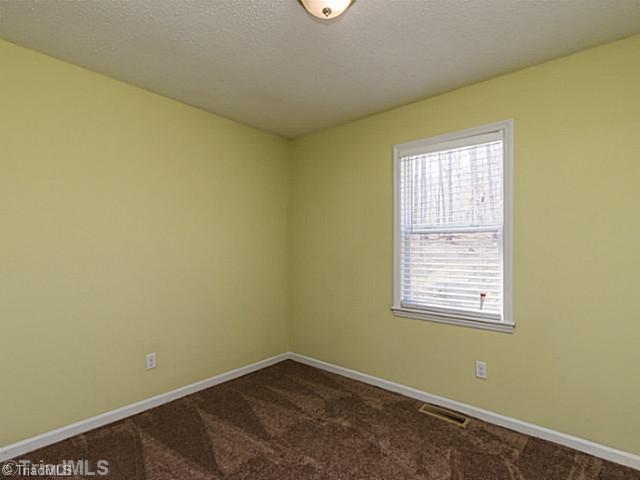 5507 John Washington Road Browns Summit, NC 27214 - Photo 10 of 16 2nd Bedroom.